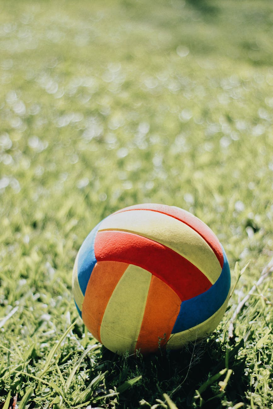 selective focus photo of multicolored soccer ball